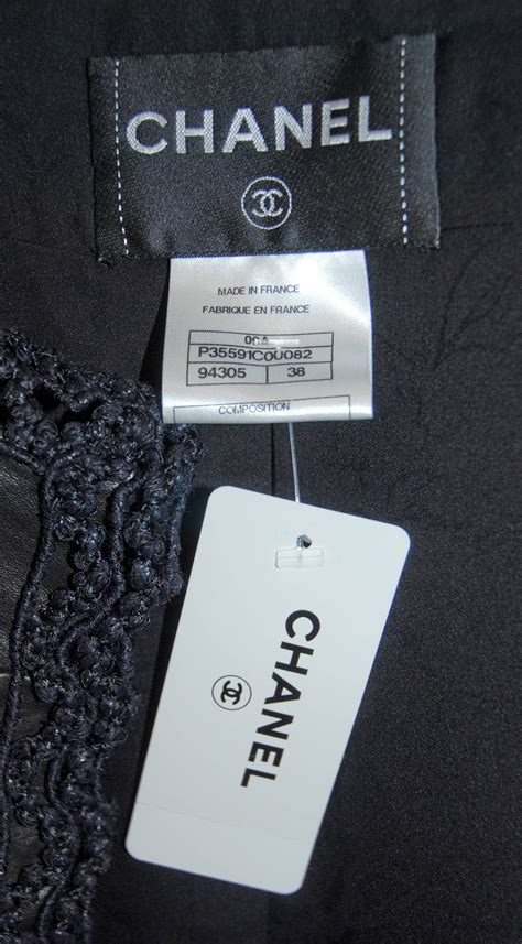 chanel new with tags|Chanel clothing tags.